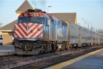 Commuter makes its station stop before shoving east